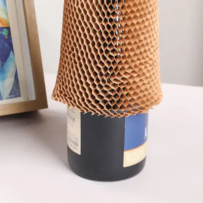 Manga de botella de papel de panal